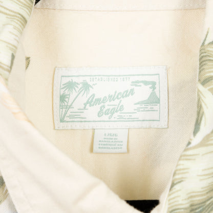 camisa hawaiana amarilla (L) american eagle